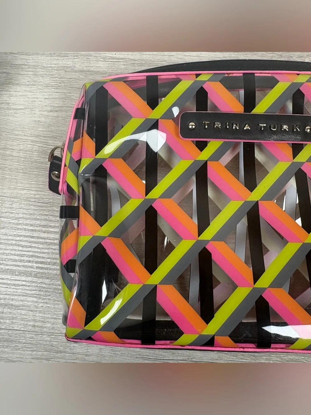 Trina Turk cosmetic bag colorful neon geometric pattern